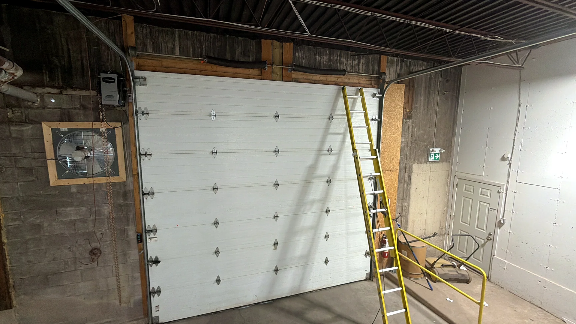 Interior view of a sectional garage door and opener system