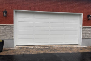 fixing garage door with hail damage