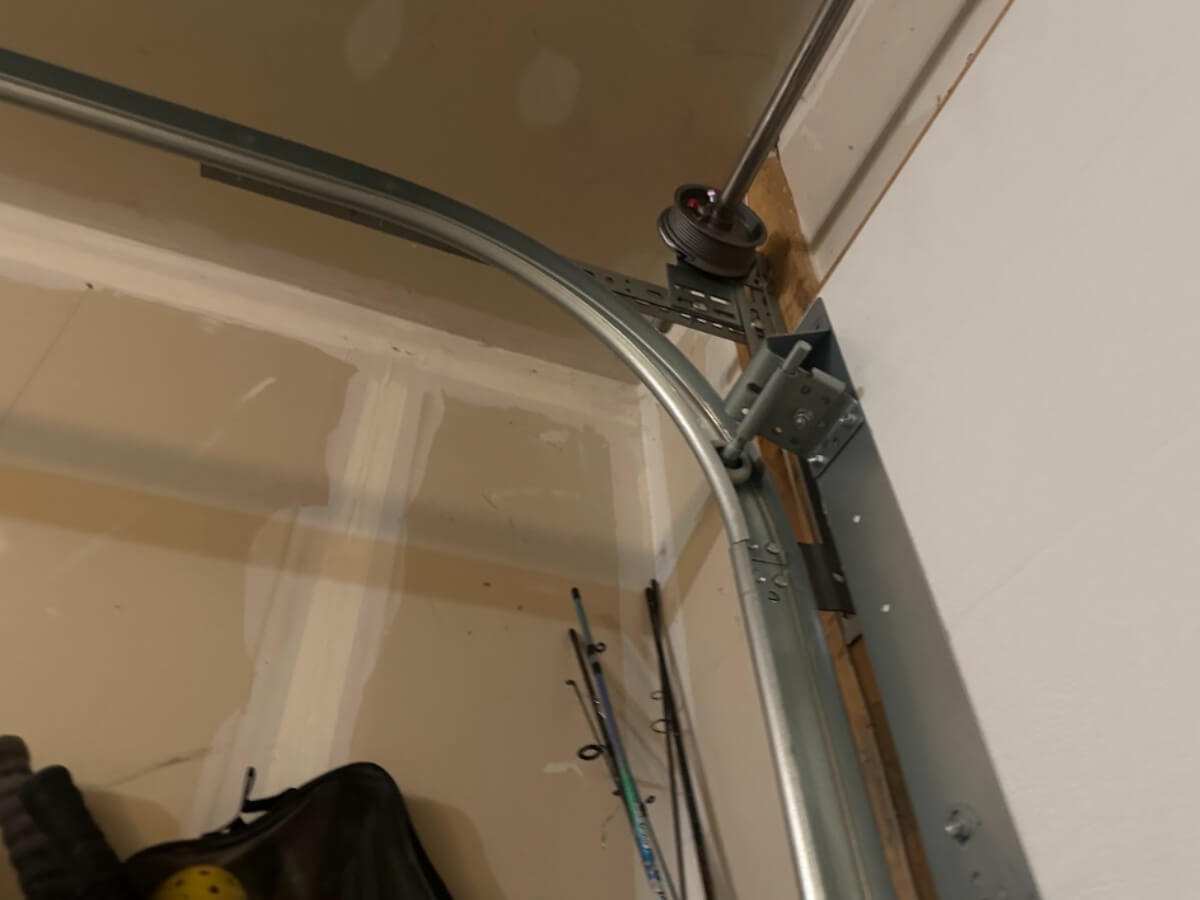 fixing garage door tracks